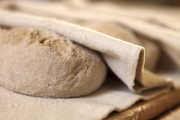 Unbaked bread on a linen cloth