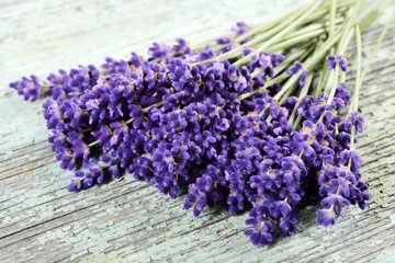 Fresh lavender flowers on a wooden surface