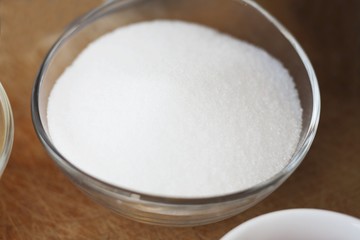 Sugar in a small glass bowl