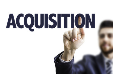 Business man pointing the text: Acquisition