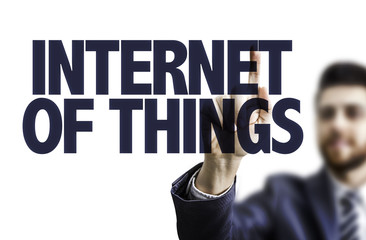 Business man pointing the text: Internet of Things