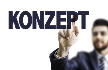 Business man pointing the text: Plan (in German)