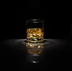 Luxury still life of whisky glass
