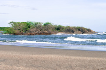 Obraz premium Beautiful beach on the Pacific ocean. This is Las Penitas - one of the closest beaches to the city of Leon, Nicaragua