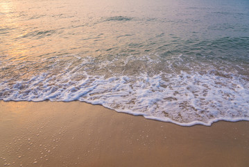 wave of sea on the sandy beach.