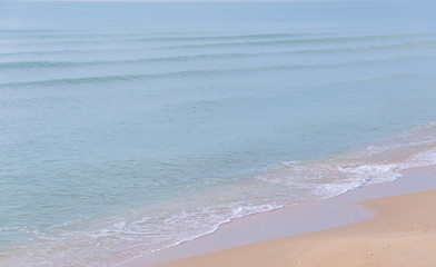wave of sea on the sandy beach.