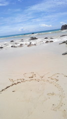 Symbol love in the beach