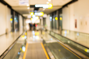 Passage in airport out of focus - Bokeh blur light background.