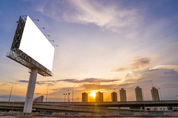 large Blank billboard ready for new advertisement with sunset.