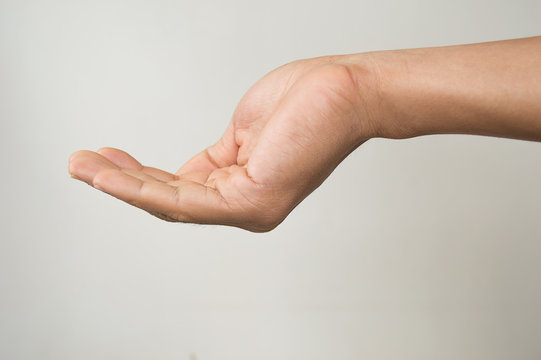 empty men hand holding isolated on gray