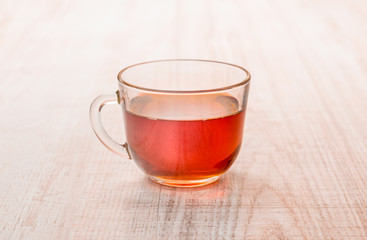 Cup of tea on wooden background