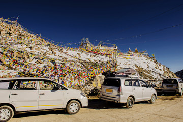 Caravan road trip at Chang La Pass, the third highest driveable mountain pass in the world 5300m. above sea level, Ladakh, J&K, India.