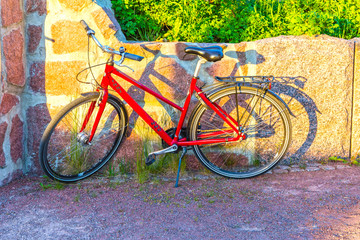 Fototapeta na wymiar Bicycle stands near wall on the street in in Mariehamn, Aland islands, Finland