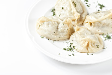 Traditional Georgian khinkali or dumplings, stuffed with meat