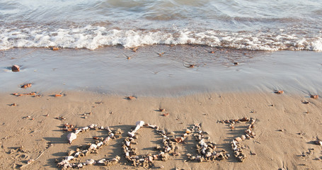 Calendar on sand. Year 2017