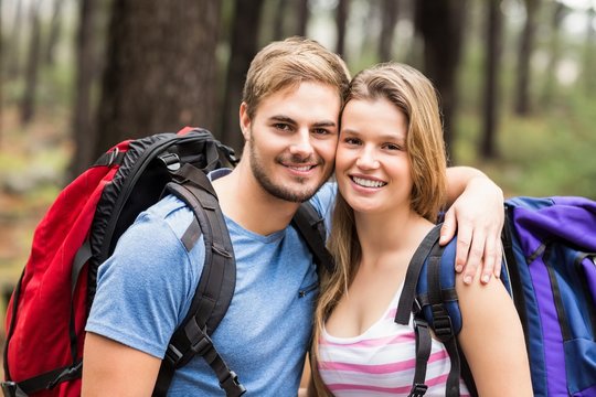 Portrait of a young happy hiker couple