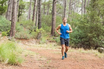 Young happy jogger running