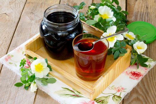 Home Health Rosehip Syrup On A Wooden Table