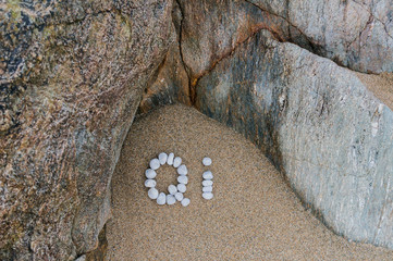 Text Lebensenergie Qi aus Kieselsteinen gelegt