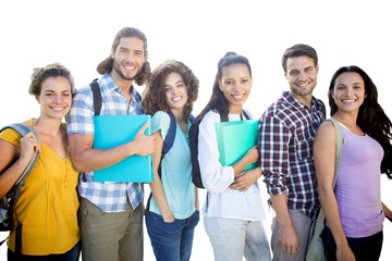 Obraz premium Composite image of smiling group of students standing in a row