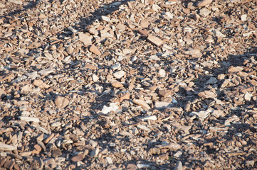 Abstract background of pebbles on a beach with plenty of copy sp