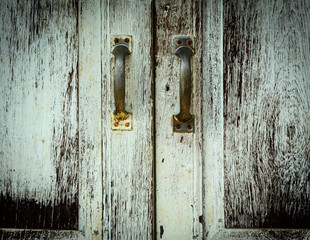 Old painted door with handles