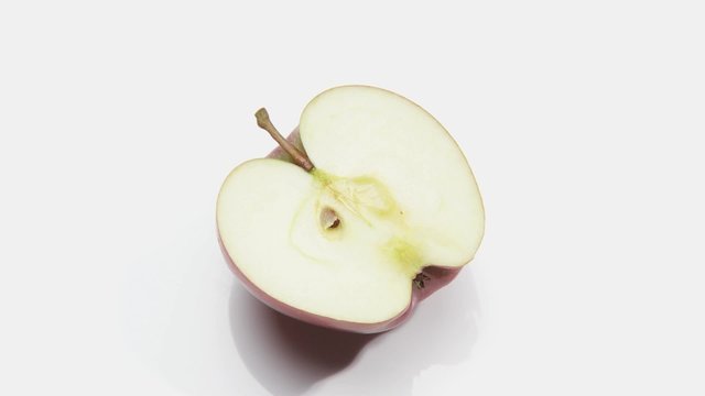 Rotating apple half