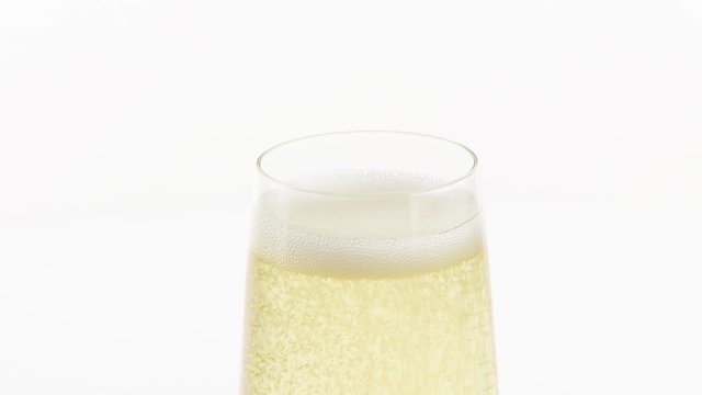A glass of sparkling wine (detail)