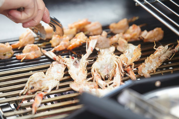 Shrimp on skewers on the grill