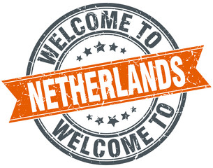 welcome to Netherlands orange round ribbon stamp