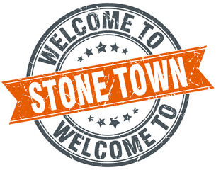 welcome to Stone Town orange round ribbon stamp