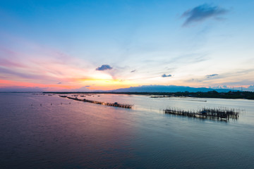 Thai's traditional fish baskets and morning landscape view from the bridge (Taksin Maharat Bridge) in Chonburi province, Thailand.