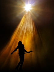 guitariste heros spot silhouette scène concert musique musicien