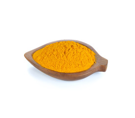 Turmeric powder on wooden bowl on white backgrown