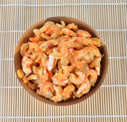 Dry shrimp with bamboo background