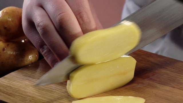 Cutting a potato into sticks