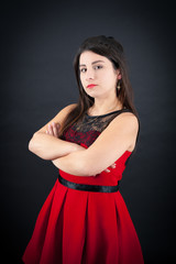 Fototapeta premium Beautiful woman doing different expressions in different sets of clothes: arms crossed