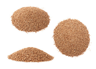 Pile of buckwheat seeds isolated