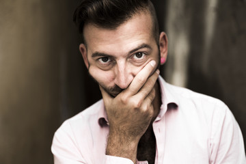 Fototapeta premium Portrait of young, depressed man in pain
