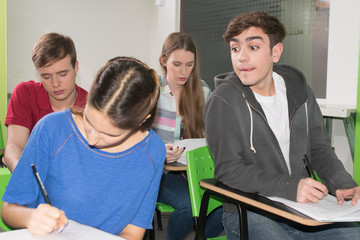 Teenagers studying