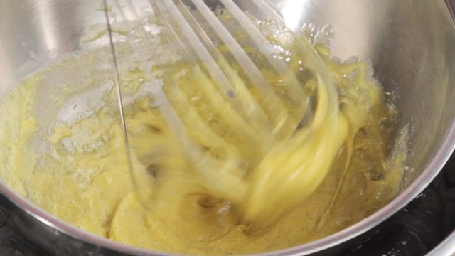 Whisking vanilla custard