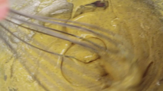 Whisking vanilla custard