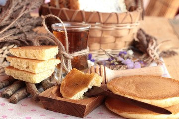 Fototapeta na wymiar sweet pancake with honey of delicious.