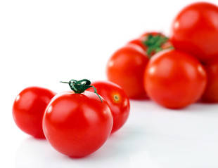 Group of cherry tomatoes isolated on white