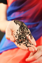 Image of henna on female hand, closeup