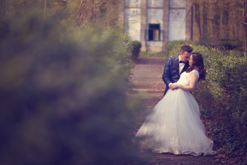 Fototapeta premium Bride and groom dancing