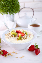 Healthy breakfast with homemade oatmeal, close up