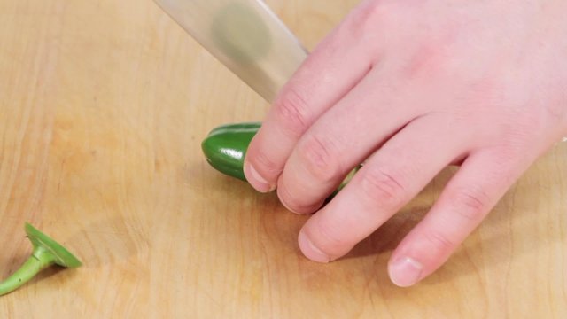 Slicing a jalapeno chilli