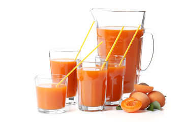 Glasses of apricots juice isolated on white