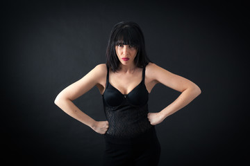 Naklejka premium Beautiful woman doing different expressions in different sets of clothes: posing